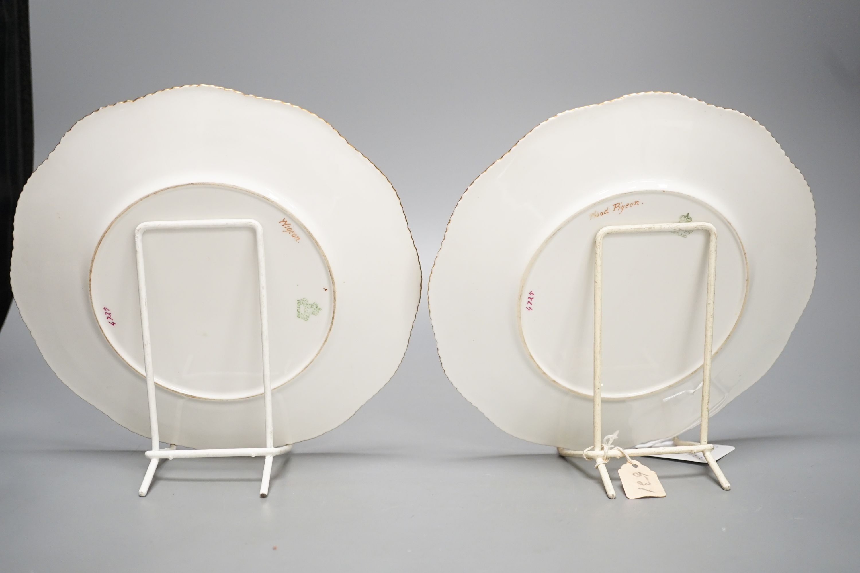 A late 19th century Aynsley pair of plates painted by F. Micklewright each signed, with a Widgeon or Wood Pigeon named verso 22cm
